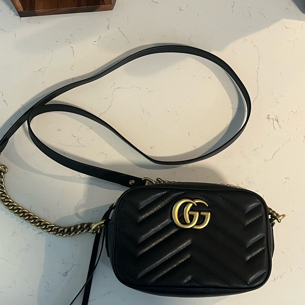 Black Gucci Women's Crossbody Bag- Gucci Marmot Camera Bag (mini) in black